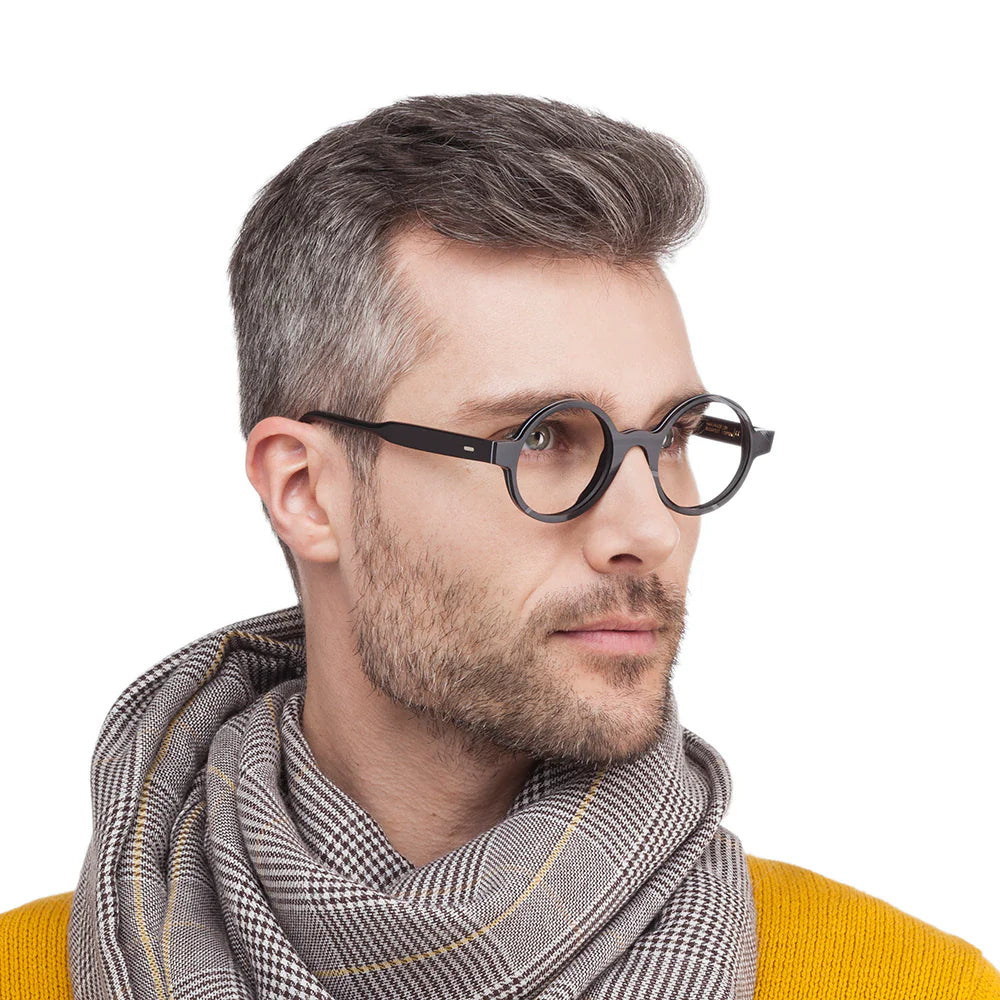 Round-framed with a vinyl record design, suitable for prescription lenses.