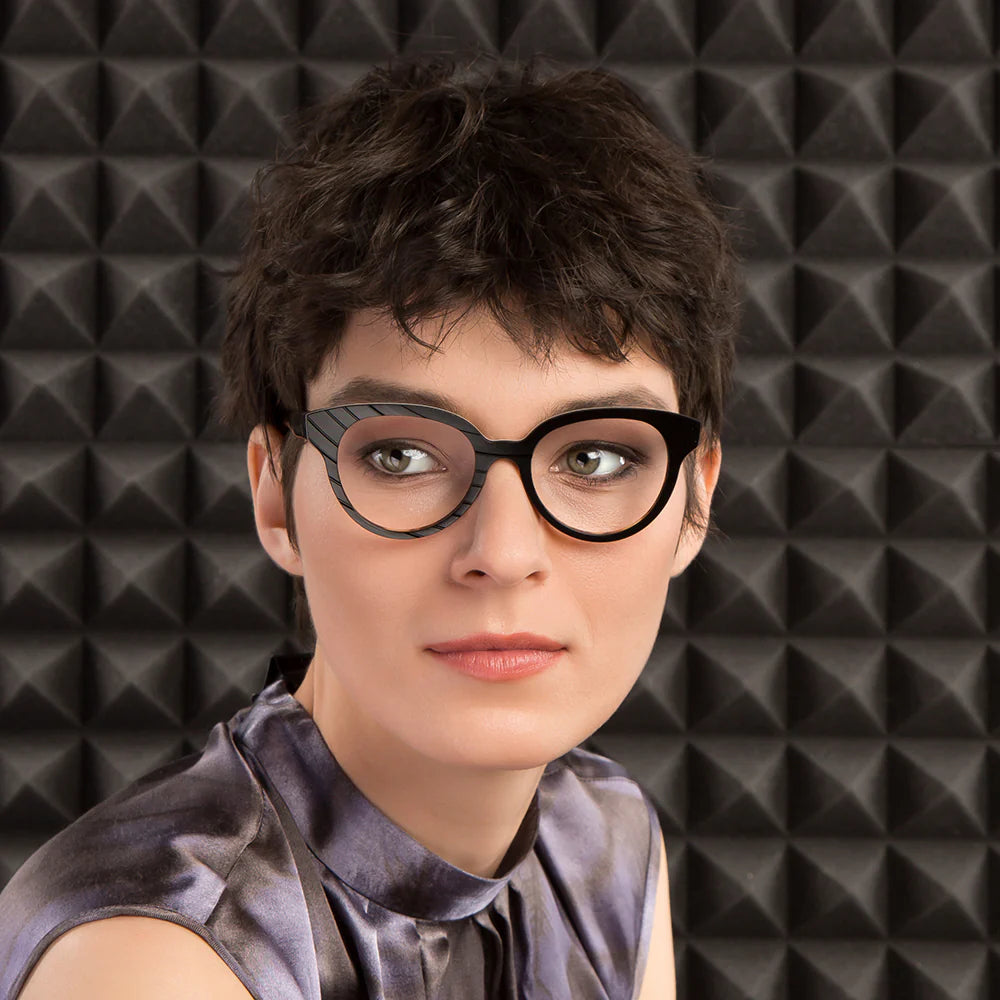 Cat-eye style with a plastic frame eyewear.