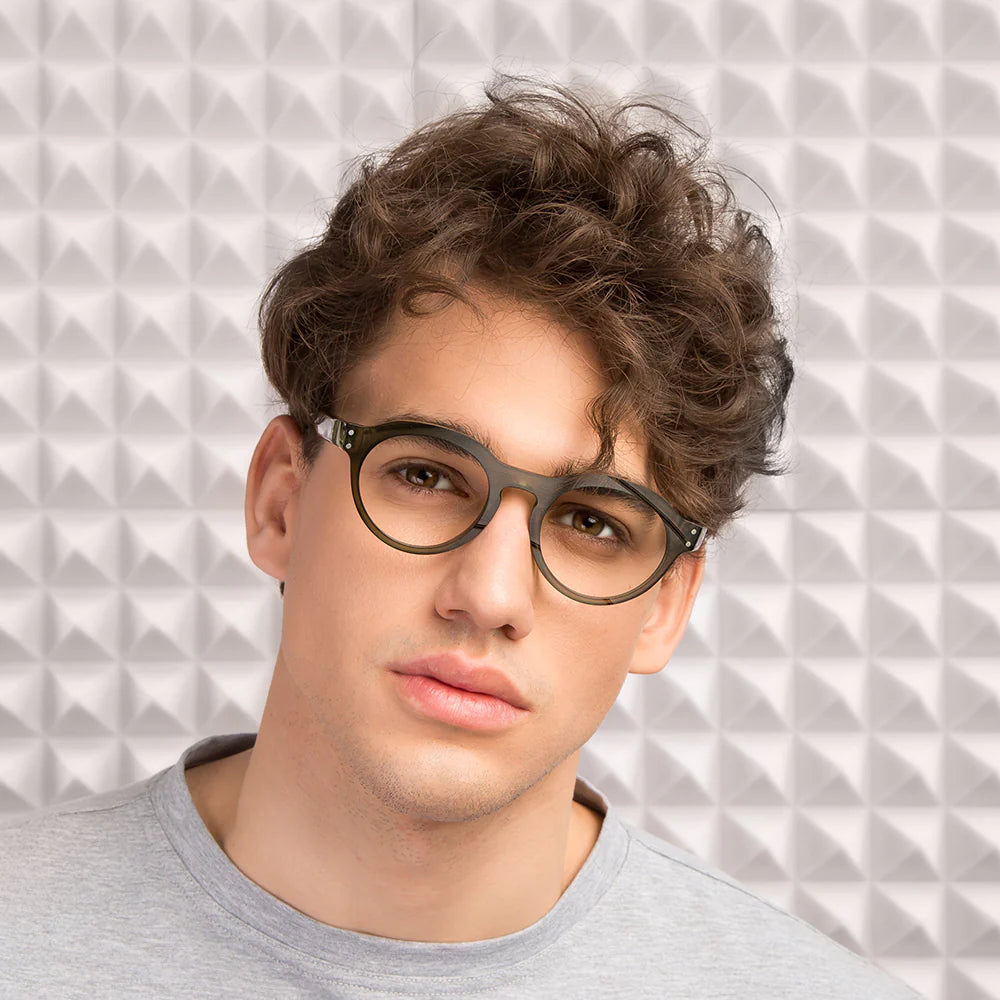 blue round full-frame eyeglasses with a keyhole bridge.