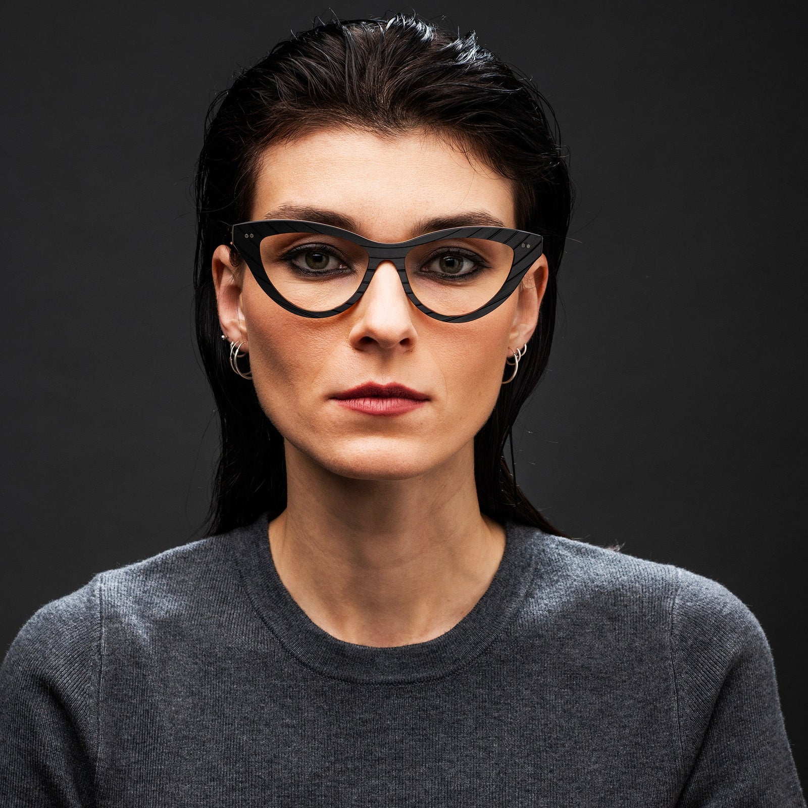 Black, medium-sized, full-frame metal eyeglasses.