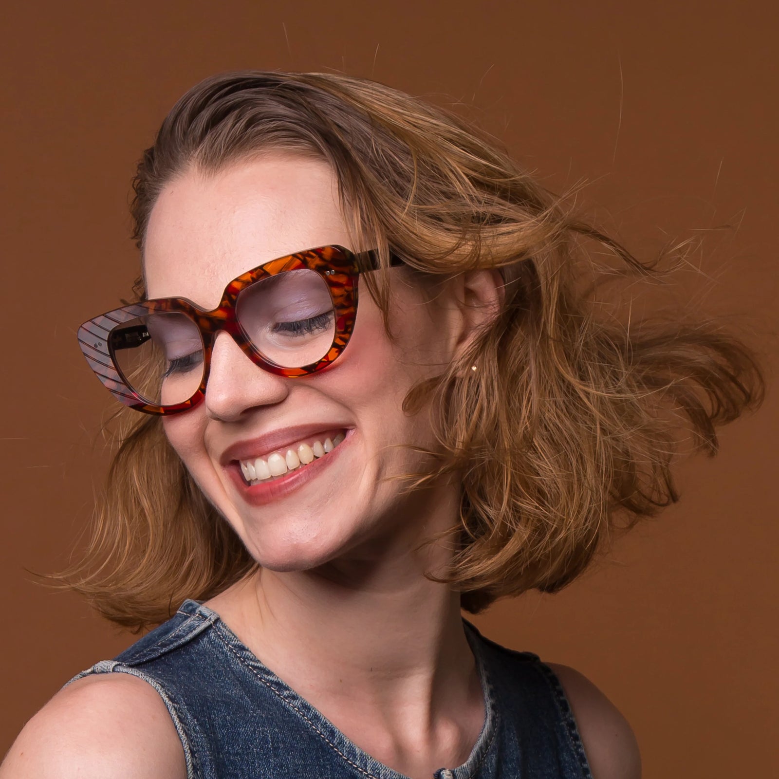 Butterfly-inspired handcrafted sunglasses made from recycled vinyl records